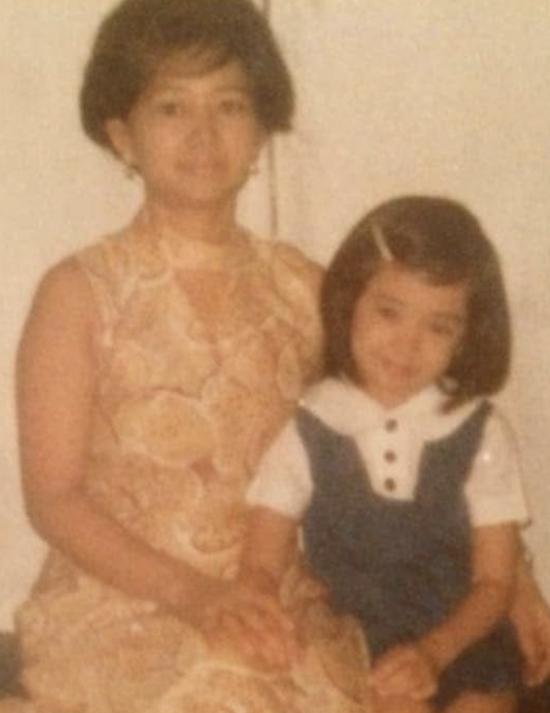 Childhood photo of Liza Adams with her mother
