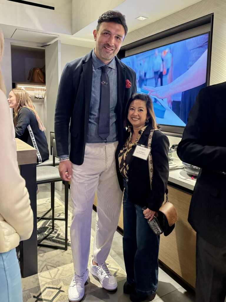 Liza Adams with Zaza Pachulia, former Golden State Warriors center