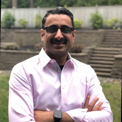 Headshot of Sri Srinivasan, Chief AI Officer at Hellman & Friedman