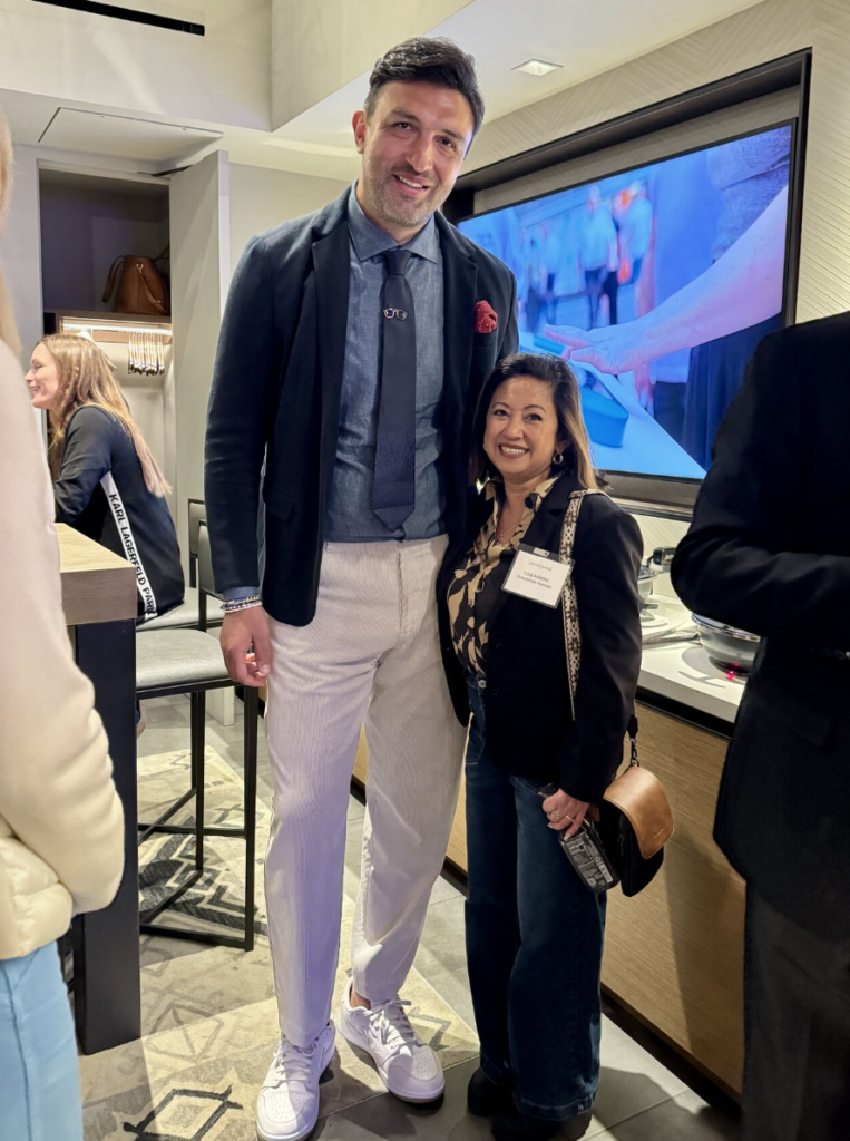 Liza Adams with Zaza Pachulia, former Golden State Warriors center